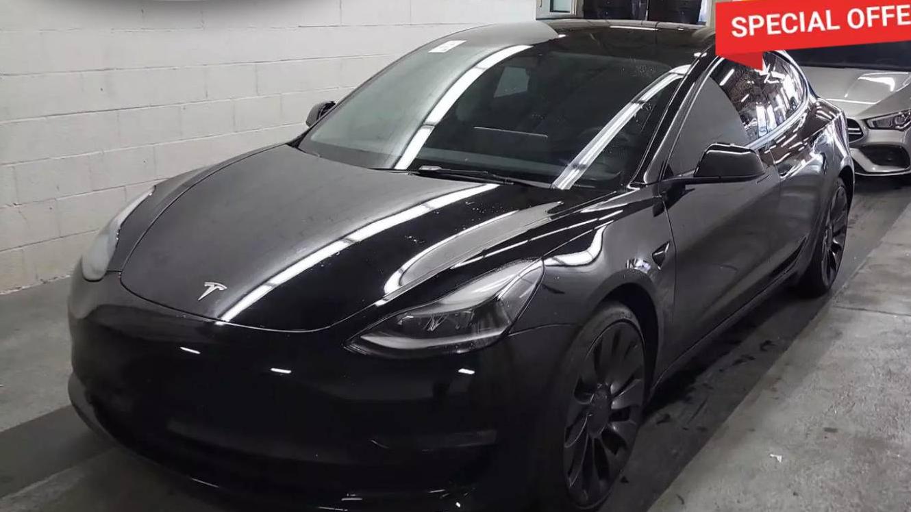 TESLA MODEL 3 2023 5YJ3E1EC5PF382643 image